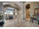Spacious foyer leading to living spaces with luxurious details and elegant lighting at 30 Via Tiberius Way, Henderson, NV 89011
