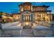 Inviting outdoor space with plush seating arranged around a fire pit, creating a cozy gathering area at 30 Via Tiberius Way, Henderson, NV 89011