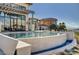 Relaxing outdoor pool with waterfall feature and outdoor seating area, perfect for entertaining guests at 30 Via Tiberius Way, Henderson, NV 89011