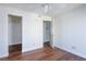 Minimalist bedroom featuring wood-style flooring, ample closet space, and bright lighting at 3550 Bay Sands Dr # 2027, Laughlin, NV 89029