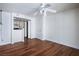 Bright living room with wood-look flooring, a ceiling fan, and direct access to the entrance door at 3550 Bay Sands Dr # 2027, Laughlin, NV 89029