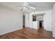 Inviting living room with wood floors and a ceiling fan, flowing into a compact kitchen area at 3550 Bay Sands Dr # 2027, Laughlin, NV 89029