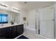 Bright bathroom features double sinks, a soaking tub and separate glass shower at 357 Stone Fly Rd, North Las Vegas, NV 89032
