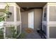 Charming entryway featuring a 'Welcome friends & Gathering' doormat at 357 Stone Fly Rd, North Las Vegas, NV 89032