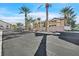 Desert Pine Villas features lush landscaping, community parking, and well-maintained buildings at 3933 Lazy Pine St # 204, Las Vegas, NV 89108