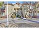Attractive two-story condo featuring well maintained landscaping and inviting walkways at 3933 Lazy Pine St # 204, Las Vegas, NV 89108