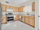 Eat-in kitchen features stainless appliances and ample cabinet space at 3933 Lazy Pine St # 204, Las Vegas, NV 89108