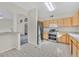 Bright kitchen with stainless steel appliances and an open layout at 3933 Lazy Pine St # 204, Las Vegas, NV 89108