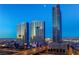 Stunning aerial view of modern high-rise buildings against the city skyline at twilight at 4471 Dean Martin Dr # 2705, Las Vegas, NV 89103