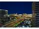 Breathtaking night view of the city with bright lights, a clear sky, and long exposure car light trails at 4471 Dean Martin Dr # 2705, Las Vegas, NV 89103