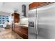 Modern kitchen boasts stainless steel refrigerator, sleek cabinetry, and seamless flow into the living space at 4471 Dean Martin Dr # 2705, Las Vegas, NV 89103