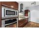 Close-up showcasing stainless steel kitchen appliances including microwave, oven, and granite countertops at 4471 Dean Martin Dr # 2705, Las Vegas, NV 89103