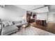 Spacious living room with an open floor plan, modern furnishings, and hardwood flooring at 4471 Dean Martin Dr # 2705, Las Vegas, NV 89103