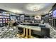 Lounge area with cozy seating, stylish decor, and modern patterned flooring at 4471 Dean Martin Dr # 2705, Las Vegas, NV 89103