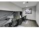 Office space featuring work stations with modern desks, chairs, and contemporary artwork at 4471 Dean Martin Dr # 2705, Las Vegas, NV 89103