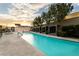 Sparkling swimming pool with comfortable lounge chairs and well-manicured landscaping at 4471 Dean Martin Dr # 2705, Las Vegas, NV 89103