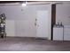 Garage space with concrete floor, washing machine and dryer hookups, and storage options available at 4480 Annie Oakley Dr, Las Vegas, NV 89121