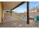 Backyard with a covered patio, low maintenance landscaping, and outdoor seating at 4519 Stardusk Falls Ave, North Las Vegas, NV 89084