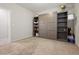 Bedroom showcasing built-in shelving and a Murphy bed, ideal for flexible living and space-saving design at 4519 Stardusk Falls Ave, North Las Vegas, NV 89084