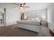 Serene main bedroom with a plush king-size bed and neutral color scheme at 4519 Stardusk Falls Ave, North Las Vegas, NV 89084