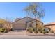 Charming single-story home with a brick driveway and a well-maintained front yard on a sunny day at 472 Cadence View Way, Henderson, NV 89011