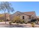 Well-maintained home with stucco exterior, tiled roof, and a neatly landscaped front yard at 472 Cadence View Way, Henderson, NV 89011