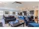 Bright living room featuring a large island kitchen, recessed lighting, and neutral color palettes at 472 Cadence View Way, Henderson, NV 89011