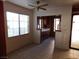 Tile dining room adjacent to kitchen with hanging ceiling fan and window at 4855 S Torrey Pines Dr # 102, Las Vegas, NV 89103