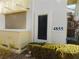 Well-maintained exterior of a home with desert landscaping, and visible address number at 4855 S Torrey Pines Dr # 102, Las Vegas, NV 89103