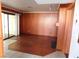 Spacious living room with hardwood floors, fireplace, and sliding glass doors at 4855 S Torrey Pines Dr # 102, Las Vegas, NV 89103
