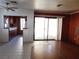 Bright living area with tile flooring, patio access, and a view into the kitchen at 4855 S Torrey Pines Dr # 102, Las Vegas, NV 89103