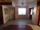 Spacious living room with tile floors, ceiling fan, and natural light, ready for new decor at 4855 S Torrey Pines Dr # 102, Las Vegas, NV 89103