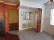 Open concept living area, featuring tile floor, ceiling fan, and access to other rooms at 4855 S Torrey Pines Dr # 102, Las Vegas, NV 89103