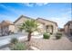 Attractive single-story home with desert landscaping including mature palm tree at 5863 Corbin Ave, Las Vegas, NV 89122