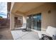 Covered patio with outdoor seating, offering a relaxing outdoor living space at 5863 Corbin Ave, Las Vegas, NV 89122