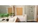 Modern bathroom featuring a glass-enclosed shower, a soaking tub, double sinks, and stylish fixtures at 7858 Nookfield Dr, Las Vegas, NV 89147