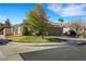 Street view of a well-maintained home with manicured lawn at the corner of Silver Bay and Green Mesa at 8427 Green Mesa Ct, Las Vegas, NV 89147