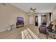 Open-concept living room featuring wood flooring and natural light at 8427 Green Mesa Ct, Las Vegas, NV 89147