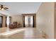 Inviting living room with hardwood floors, comfortable seating, and natural light at 8427 Green Mesa Ct, Las Vegas, NV 89147