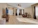 Open-concept living room featuring wood flooring and natural light at 8427 Green Mesa Ct, Las Vegas, NV 89147