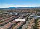 Picturesque aerial view showcases community access to schools, retail, and nearby city amenities at 8453 Garnet Peak Ct, Las Vegas, NV 89117