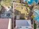 Aerial view showing a beautiful backyard with a pool, patio and a cozy seating area at 9836 La Vid Ct, Las Vegas, NV 89117