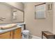 Bathroom showcasing a modern vessel sink, framed mirror, and contemporary fixtures at 9836 La Vid Ct, Las Vegas, NV 89117