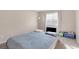 Clean bedroom with neutral walls, plush carpet and a full-size bed at 9836 La Vid Ct, Las Vegas, NV 89117