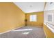 Upstairs loft area with cozy carpeting and lots of sunlight at 9836 La Vid Ct, Las Vegas, NV 89117