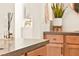 Bathroom countertop featuring a sleek vanity with a modern vase with greenery at 12103 Canyon Sunset St, Las Vegas, NV 89138