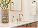 Bathroom featuring a quartz countertop, bronze fixtures, and modern decor at 12103 Canyon Sunset St, Las Vegas, NV 89138