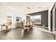 Stylish dining room features modern decor, plenty of natural light, and access to the outdoor area, great for gatherings at 12103 Canyon Sunset St, Las Vegas, NV 89138