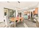 Bright dining area with modern light fixtures and a view of the kitchen offers ample space for Gathering gatherings at 12103 Canyon Sunset St, Las Vegas, NV 89138