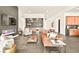 Wide view of modern living room, featuring a fireplace, bar, and open layout at 12103 Canyon Sunset St, Las Vegas, NV 89138